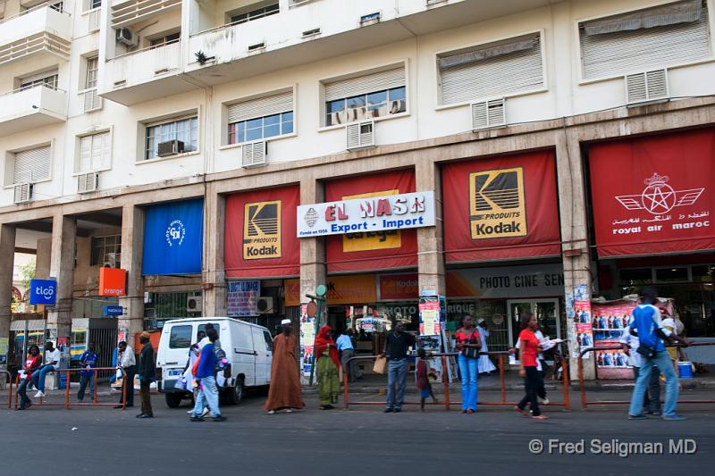 20090528_094956 D3 P1 P1.jpg - View of one of the streets just off Independence Square.  Senegal has some 11 million people; greater Dakar has more than 2 million people.  In addition to the local language, many people speak French.  About 50,000 Europeans live in Dakar, mostly French and Lebanese.  There are also a sizable Chinese and Vietnamese population